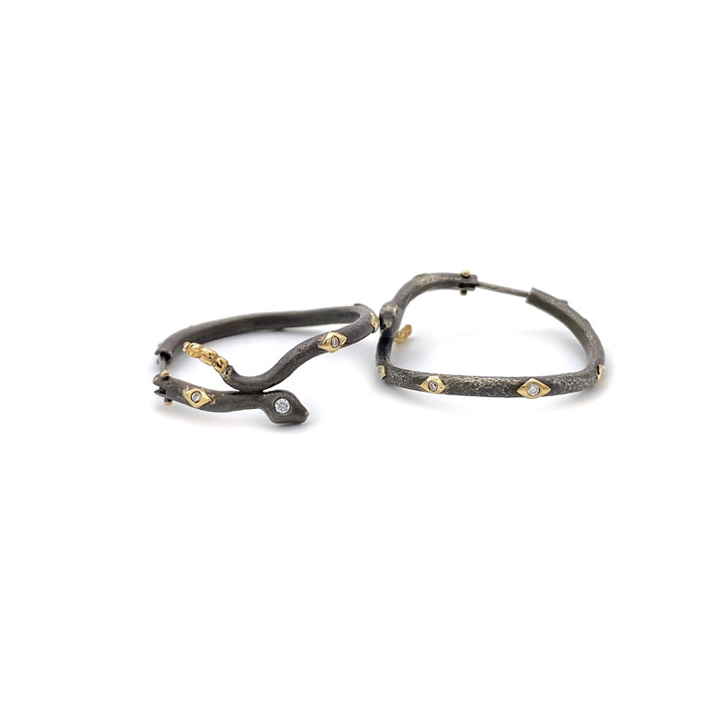 Gold and silver Diamondback hoops with diamonds